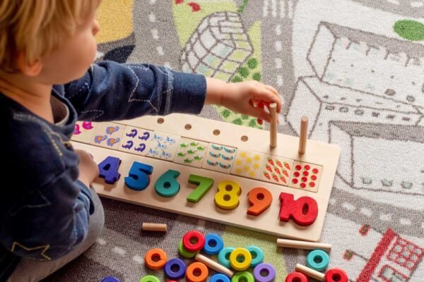 Baby toddler early development. Wooden stack and count rainbow c